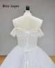 Hire Lnyer Sweetheart Neck Short Sleeve Lace Up Back Full Pearls Body Shiny Beads Sequins Skirt Sparkly Ball Gown Wedding Dresses