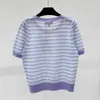 Kvinnors t-shirt designer gaoding xiaoxiang 24 sommar ny tunt ull silke ihålig rand kort ärm pullover stickad t-shirt rynt