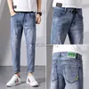Mäns jeans män jeans 2022 vår/sommar koreansk utgåva elastiska smala fit leggings ungdomar mångsidig 9-poäng student jeans plus size byxor