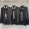 Camicette da donna industria pesante camicia colorata di strass cravatta 2024 POLO POLO COLLAR CANSEVE LUSCA PERLA NERO PERCOLA