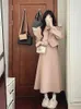 Arbetsklänningar Temperament Sweet Woolen Coat kjol Två stycken Set Women Fashion Soe Up Korean Gentle Year Solid Winter Celebrity Chic Suit