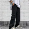 Męskie spodnie męskie spodnie ładunki stały kolor hip hop w stylu luźny wzór multi kieszeni elastyczna talia męska