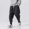 Męskie spodnie Hip Hop Cotton Harem Spodnie na męskie solidne elastyczne ubrania uliczne joggery nowe kieszonkowe spodnie kieszonkowe swobodne męskie spantsl2404