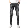 Jeans para hombres Spring and Autumn New Jeans Fashion Fashion Tendencia de moda elástica Fit Small Feet Pants jeans juveniles Pantalones de gris negro Pantalones