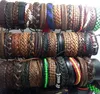 Entier 100pcs hommes femmes vintage bracelets en cuir authentiques chouvoirs de manche de surfeur cadeau de mode mixte bijoux de mode lots 4391812