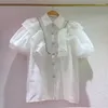 Blusas para mujeres Diamantes de verano coreanos Ruffles Puff Camisa blanca Camisa de cuello tops suelto de un solo pecho