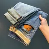 Heren jeans heren jeans lente 2024 high-end borduurwerk Amerikaanse informele broek geproduceerd met rechte pijpen ultradunne fit losse denim Q240427