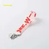 Nyckelringar lanyards mode offs brev nyckelring vit lyxiga nyckelring nyckel kedja transparent gummi gelé bokstav tryck män kvinnor canvas nyckelring kamera hänge 942