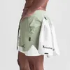 Palestra estiva maschi rapida 2 in 1 pantaloncini che jogging fitness allenamento di spiaggia pantaloni corti da allenamento sportivo maschio abbigliamento casual 240424