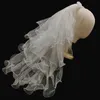 Jóias de cabelo de casamento tule curto véu de noiva barato com pente 2021 Acessórios de casamento de venda mariage 2 camadas caldo de marfim branco simples para mulheres