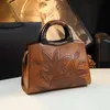 Estilo étnico de couro genuíno de couro genuíno feminino de bolsa nacional macia que se desloca de meia idade de meia-idade