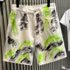 Europeiska modetrendmärken high-end och nisch jeans för mäns sommar nya graffiti capris lösa överdimensionerade shorts