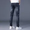 Jeans masculin printemps / été nouvel édition de jeans masculin édition tendance slim slim small raide tube pantalon pantalon denim pour hommes et pantalon taille plus