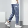 Jeans masculin printemps et automne nouveau jean masculin en vrac de style raide de la jambe tendance pantalon de couleurs décontractées élastique et pantalon de taille plus