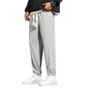 Pantalon masculin sport porte des pantalons de glace de gym pantalones couleurs massives pantalon harem à la mode semelle décontractée jogger pour hommes élastiques