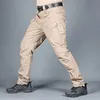 Herenbroeken Herenbroeken Militaire tactische vrachtbroeken met meerdere zakken Safari-stijl broek waterdichte heren straat kleding wandelen plus maat S-6XLL2404