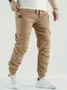 Men's Pants 2024 New jogger cargo pants mens harem pants hip-hop casual multi pocket mens sports pants mens sports pantsL2403