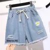 Damesshorts Vintage Lacing Onregelmatige shorts Zomer Nieuwe elastische taille Solid kleur losse jeugd breedbeenbroek Casual mode Vrouwen kleding D240426