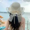 Breda randen hattar hink kvinnor vår/sommar mode stora takfot stråhatt solskade och solskyddsmedel sol utomhus strand trendig q240427