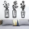 Vazen thuis woonkamer ijzer vaas metalen bloemwand hanger bloemen planten sculptuur minimalistisch kunst zwart smeedde decor