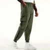 Men's Pants Classic design multi flap pocket cargo jogging pants mens loose fit suitable for dragging harem cargo jogging pantsL2404