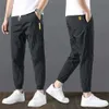 Mäns byxor Summer Mens Casual Sports Pants Polyester Korean Mens Ankle Tie Jogging Pants Breattable Solid Color Casual Pantsl2403