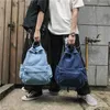 Рюкзак светло -голубая корейская повседневная джинсовая джинсовая пака модный мужской студент -студент на открытом воздухе рюкзаки для туристической сумки
