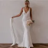 Sexy zeemeermin crêpe v-neck trouwjurken lange geplooide ivoorvestido de novia trompet bruidsjurken met lint voor vrouwen