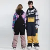Pantalones para hombres pantalones de esquí de esquí de invierno a prueba de agua reflectante reflectante de esquí transpirable pantalones femenino pantalones de snowboard femenino