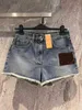 Damesshortsontwerper 24 lente/zomertijdperk vermindert het temperament veelzijdige hoge taille paneel leer oude bloembont rand ontwerp gewassen denim shorts qi7c