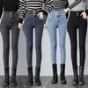 Jeans femminile Super-waist 2024 Warm Slim Elastic Winter Plus Feet Velvet Indossare pantaloni a matita da donna.