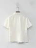 Damesblouses vrouwen shirt met korte mouwen wit of zwart casual turn-kraag 2024 zomer vrouwelijke blouse met één borsten