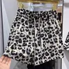 Short féminin Print léopard lâche Summer 2024 Pant de jambe large pantalon élastique haute fille pantalon mode streetwear