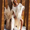 2024 Crochet Tunic Bikini cover -ups Sexy Hollow Out Mini Dres Summer Desse Tassel Beach Wear Ouderchild Cover Up Y240417