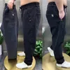 HARAJUKU STRANSE Korea Streetwear Lose solidne dżinsowe dżinsy elastyczne talia dla mężczyzn wiosna lato splusowa rozmiar 7xl 8xl Casual Pants 240424