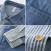 Весенняя осень американская повседневная модная бренда топ свободная вертикальная полоса лоскутная джинсовая рубашка с длинным рукавом для Men High Street Wear 240425