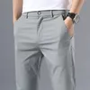 Hommes minces pantalon une couleur unie intelligente entreprise décontractée ajustement pantalon extensible des hommes pour hommes coton formel respirant 240424