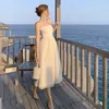 Casual Dresses Pinkoz Lady White Midi Dress Mesh Holiday Party Födelsedagsmiddag Camisole Hög midja Slim Women Fashion French