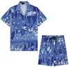 Camisas de diseñador de verano para hombres Fashion Hawaii Floral Impresión Camisa casual Hombres Mujeres Fit Slim Manga corta Ropa de playa