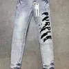 Marca de moda roxa nova jeans azul esticada slim street tiro de rua