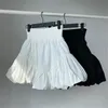 Frühlings Sommer Schwarzer Faltballkleid Rock Frauen Elastizität High-T-T-T-Line Sexy Short Rocks Unregelmäßige Rüschen weiße Tanz 240420