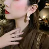 Boucles d'oreilles étalon 2024 Big Fine Elegance Pearl Slempe pour les femmes Tendance French Style Couleur rose Couleur de bijoux Simple Bijoux