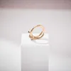 Женская группа Tiifeany Ring Jewelry Ailings и одно и то же кольцо узел S925 Серебряное покрытие 18 -каратного золота с помощью циркона простых темперамента
