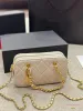 Bolso de diseño bolso bolso de piel de oveja monedas de oro woc bolso de desecho pequeño nicho de lujo de lujo de alta textura de diamantes cadena de rejilla