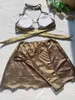 Dames badmode vrouwen metallic gouden halter bikini's sets drie stukken met gesplitste mini rok holle zwempak badpak strand outfits