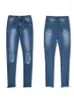 Frauen Jeans Big Loch gewaschen dünne Taillen -Denimbleistifthosen Frauen Y2K Quasten unregelmäßig schlanke fit strecke blaue Hosen