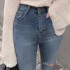 Jeans bottoni da donna femminile con pantaloni in denim ad alta vita elastico buco strappato per pantaloni elastici 2024