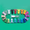 Sutoyuen 100pcs 25mm Mix 20 Farben umweltfreundliche Plastikstaatshallerhalter Spielzeugklammern Baby Dummy Bib Sooth Clip Hosentender Clips 240416