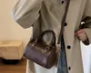 茶色の革16cmミニ女性ハンドバッグカウレザートリムキャンバス内のクラシックトラベルバッグレザーハンドルショルダーストラップ