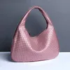High-end grote capaciteit forens Dumpling Bag geweven schoudertas voor vrouwen 2024 Koreaanse versie retro okselzaktas designer tas